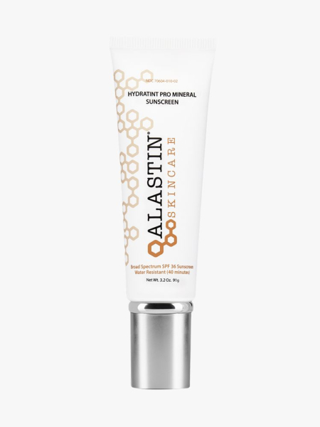 Alastin HydraTint Pro Mineral Broad Spectrum Sunscreen SPF 36 white tube with silver cap on light gray background